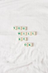 Grüne Schrift auf weisem Hintergrund "You will be ok"